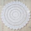 white round doily rug