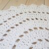 white round doily rug