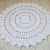 white round doily rug