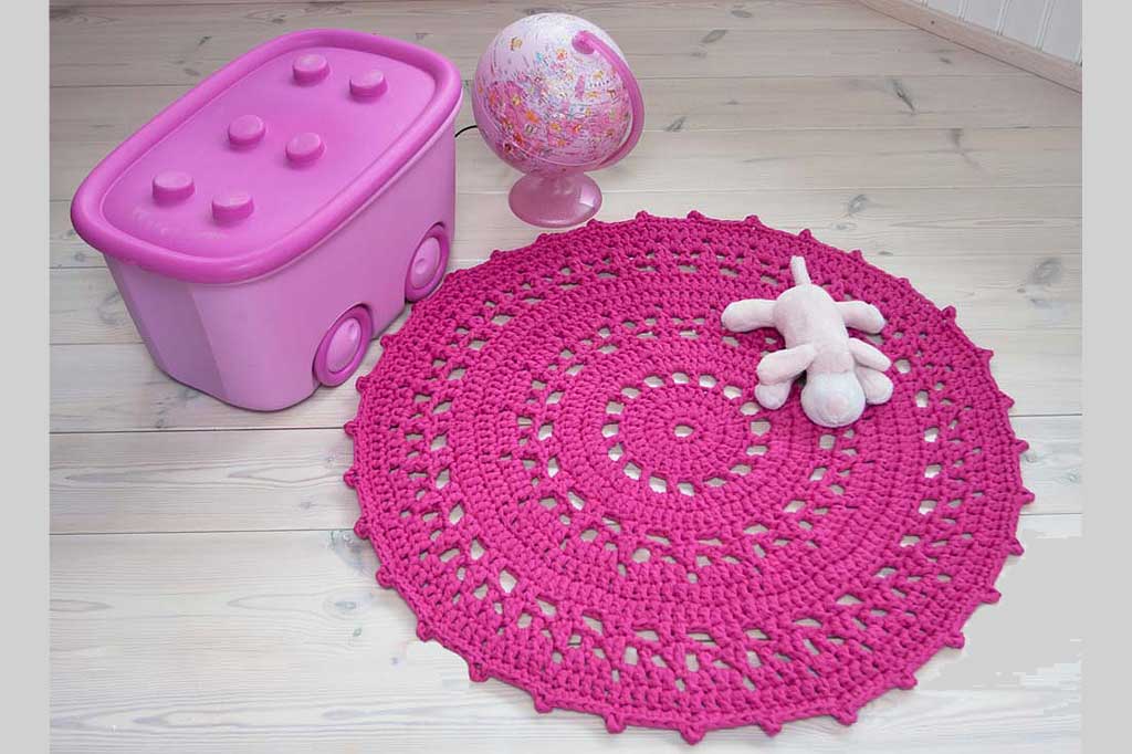 Dark pink crochet doily rug