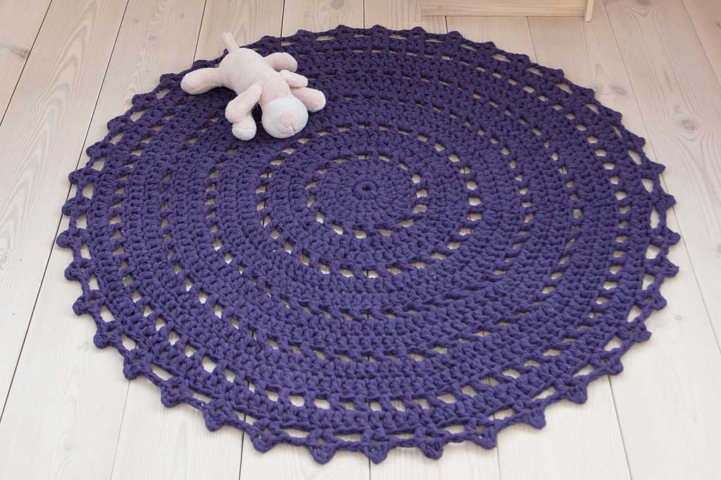 Purple round crochet doily rug