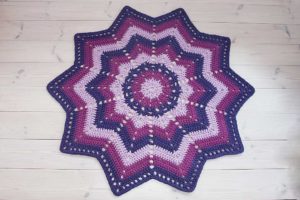 Purple striped crochet doily rug