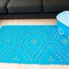 blue rectangular crochet doily rug