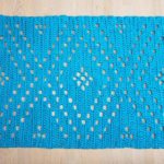 blue rectangular crochet doily rug