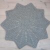 light grey star shaped crochet doily rug