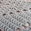 light grey star shaped crochet doily rug