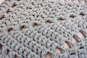 light grey star shaped crochet doily rug