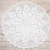 white crochet lace rug