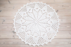 white crochet lace rug