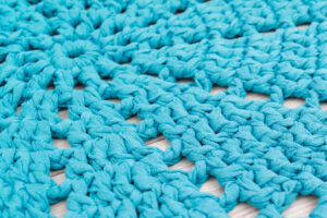 Turquoise blue crochet doily rug