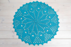 Turquoise blue crochet doily rug