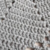 Light grey crochet doily rug