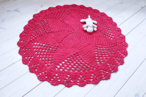 dark pink crochet doily rug