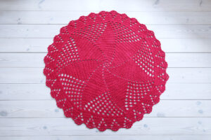 dark pink crochet doily rug for girl's room