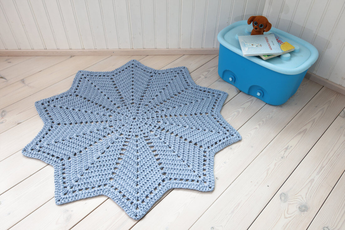 light blue star shaped crochet doily rug