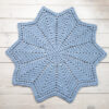 light blue star shaped crochet doily rug